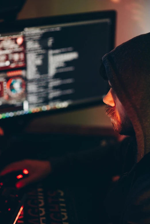 a man in a hoodie sitting in front of a computer, hacking into the mainframe, promo image, closeup shot, 2 5 6 x 2 5 6 pixels