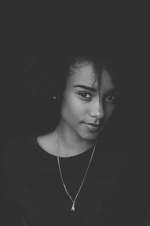 a black and white photo of a woman, by Afewerk Tekle, realism, ashteroth, professional profile picture, 18 years old, instagram picture