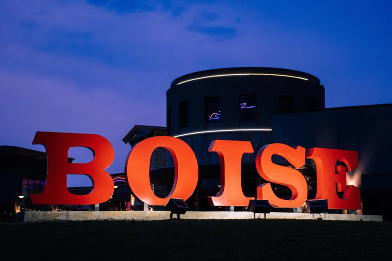 a large red sign sitting in front of a building, inspired by Zsolt Bodoni, trending on unsplash, hangzhou, posse features, bosnian, profile image