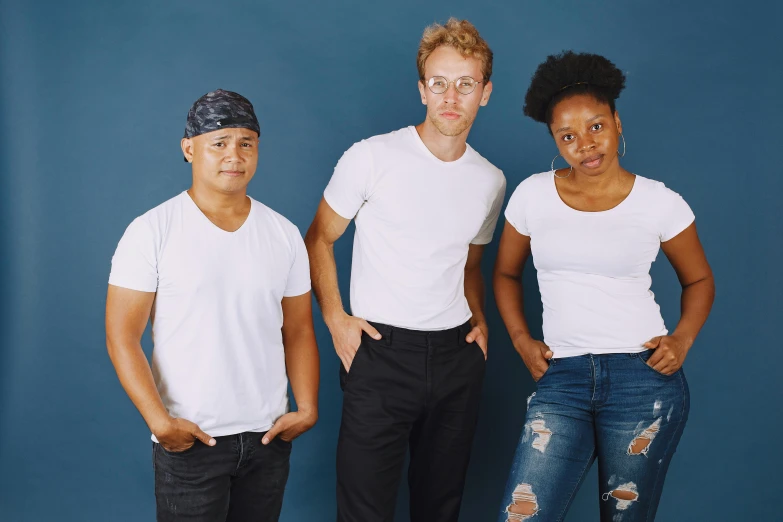 a group of three people standing next to each other, cool white, diverse, promo photo, easygoing