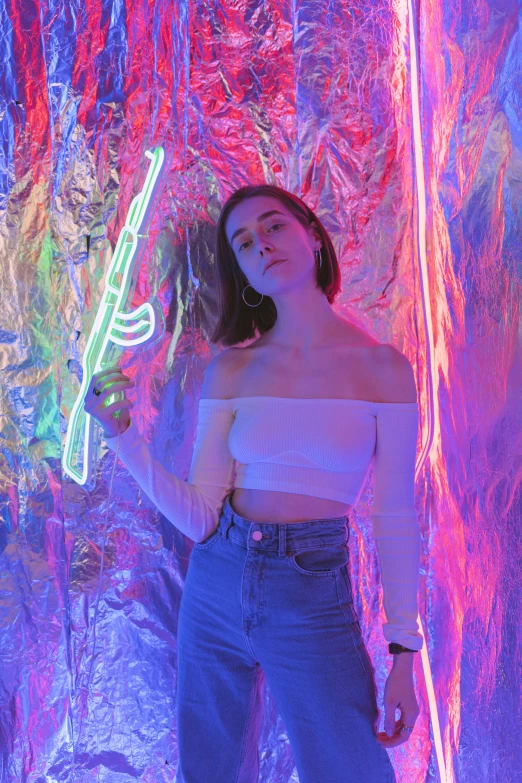 a woman standing in front of a wall with neon lights, with pistol, charli bowater, muted rainbow tubing, instagram model