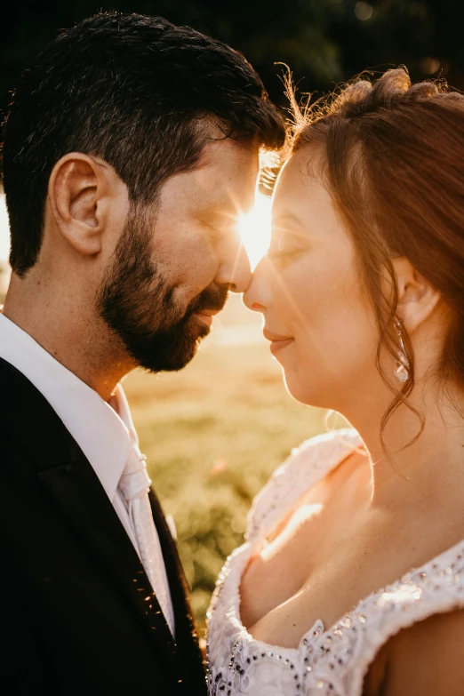 a man and a woman standing next to each other, pexels contest winner, renaissance, golden hour closeup photo, groom, light stubble, full colour