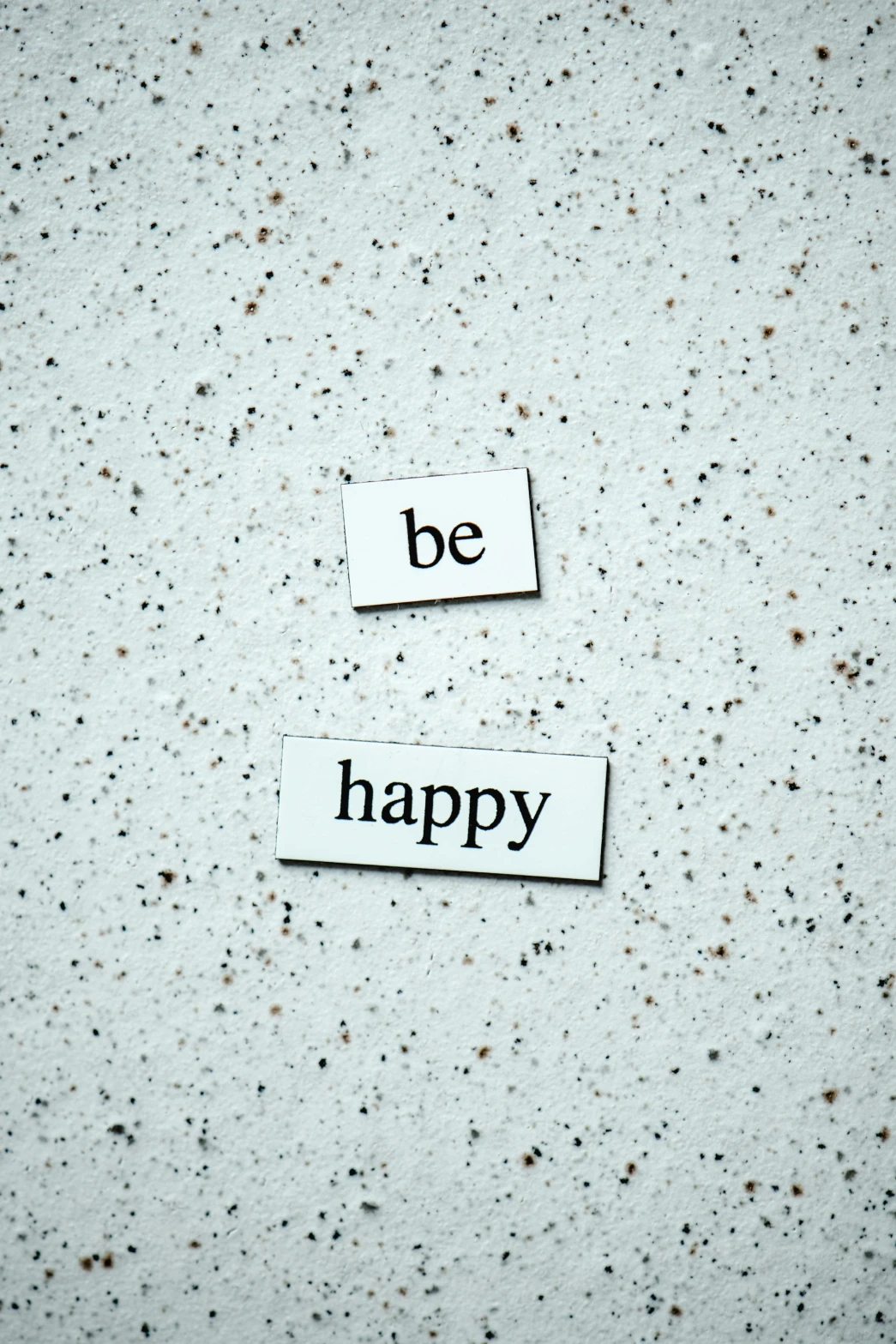 a piece of paper with the words be happy on it, pexels, magnetic, made of all white ceramic tiles, paul barson, wall art