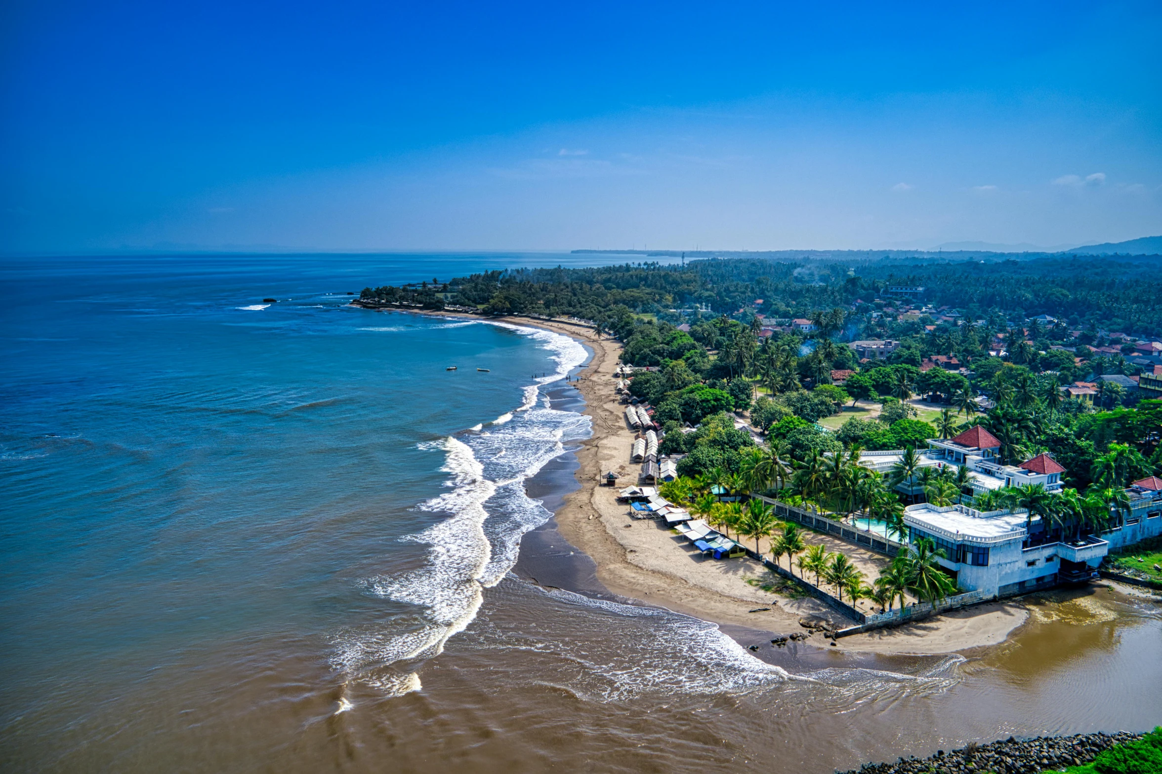 a large body of water next to a beach, happening, colombia, background image, university, bali