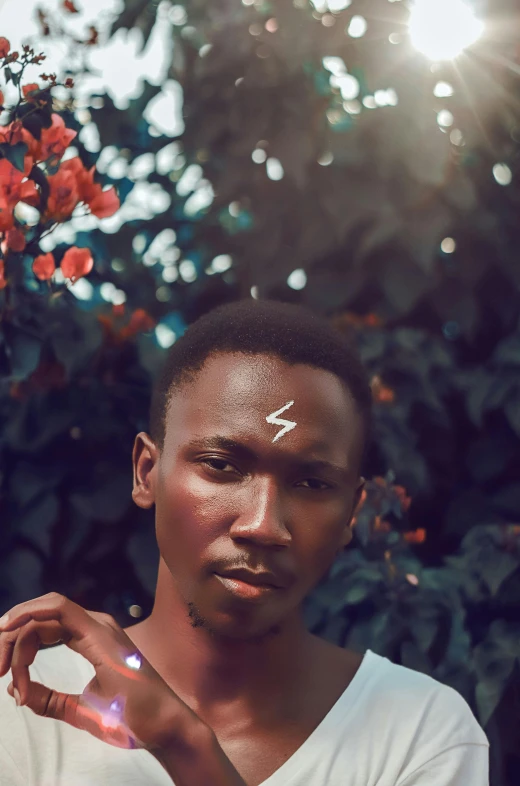 a man standing in front of a bush with flowers, trending on pexels, afrofuturism, lightning bolt scar on forehead, dark skin, graceful face, lights