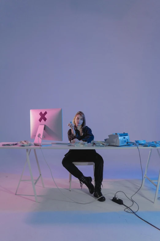 a woman sitting at a desk with a laptop, an album cover, by artist, computer art, xqc, teenage engineering moad, press photos, broken down