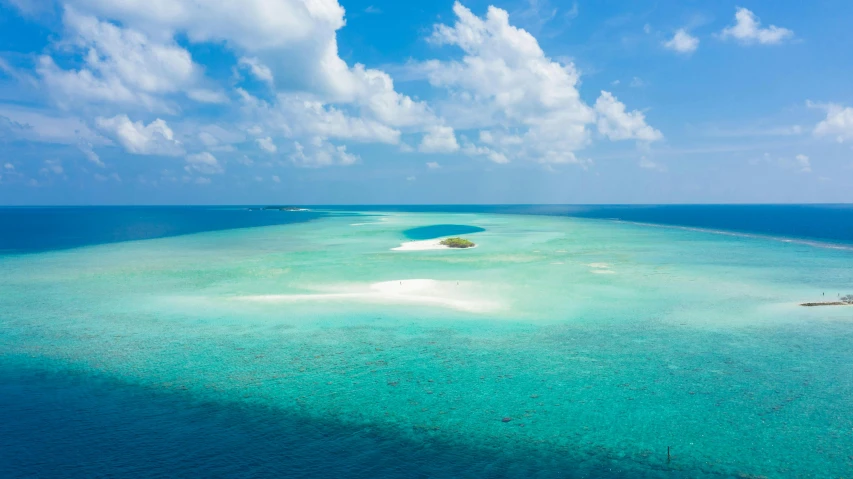 an island in the middle of the ocean, by Peter Churcher, pexels contest winner, hurufiyya, maldives in background, crystal clear blue water, dezeen, sandy green