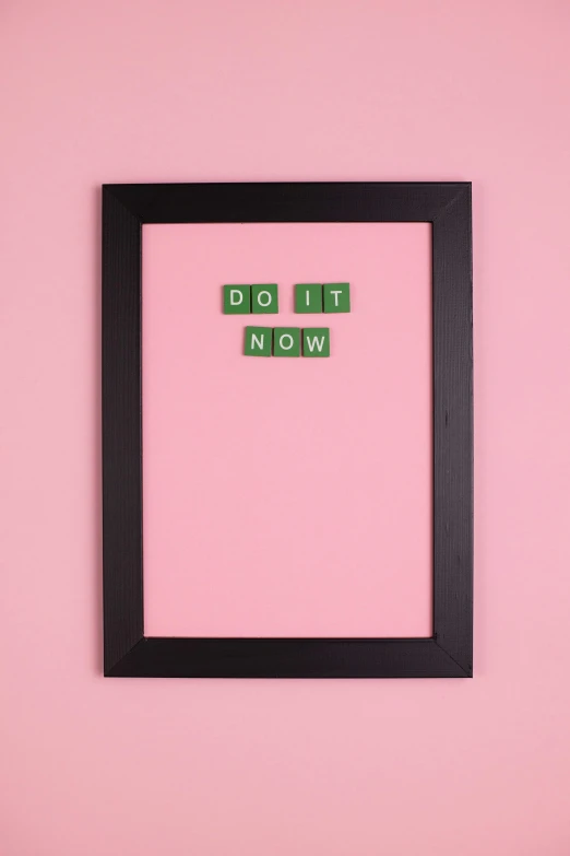 a pink wall with a black frame that says the dog mom, by Dulah Marie Evans, unsplash, dada, procrastination, magnetic, green letters, now