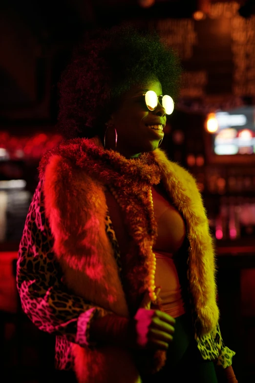 a woman with green eyes standing in front of a bar, an album cover, pexels, afrofuturism, yellow fur, underlit, movie still, glow in dark