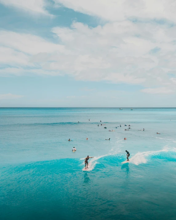 a group of people riding surfboards on top of a wave, crystal clear blue water, trending art, thumbnail, standing on a beach in boracay