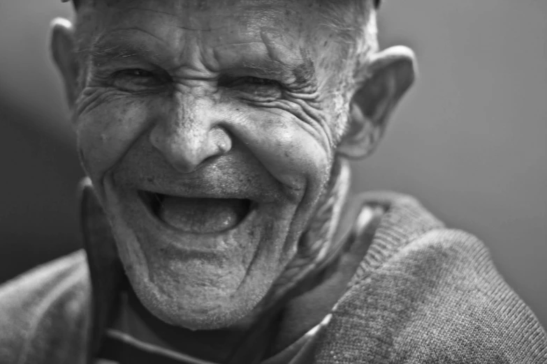 a black and white photo of an old man laughing, a black and white photo, pexels contest winner, photorealism, broken teeth, a photo of a man, happy people, smiling in heaven