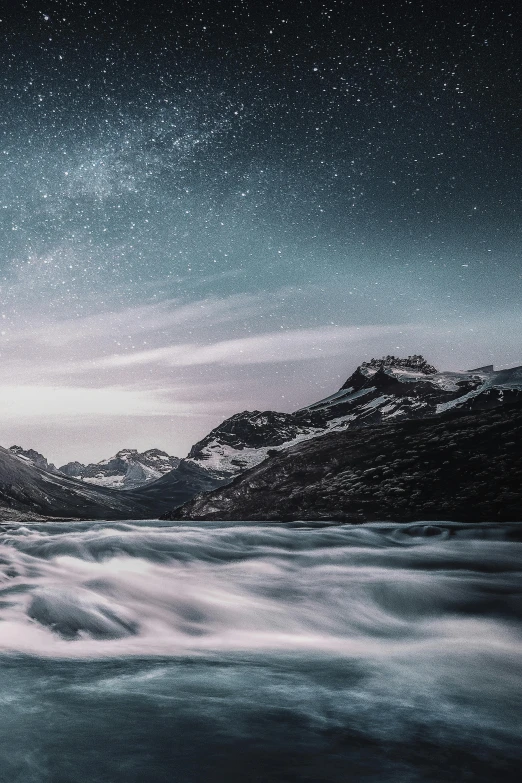 a body of water with snow covered mountains in the background, by Daniel Seghers, unsplash contest winner, starfield in background, rapids, 5 0 0 px, lost in the milky void