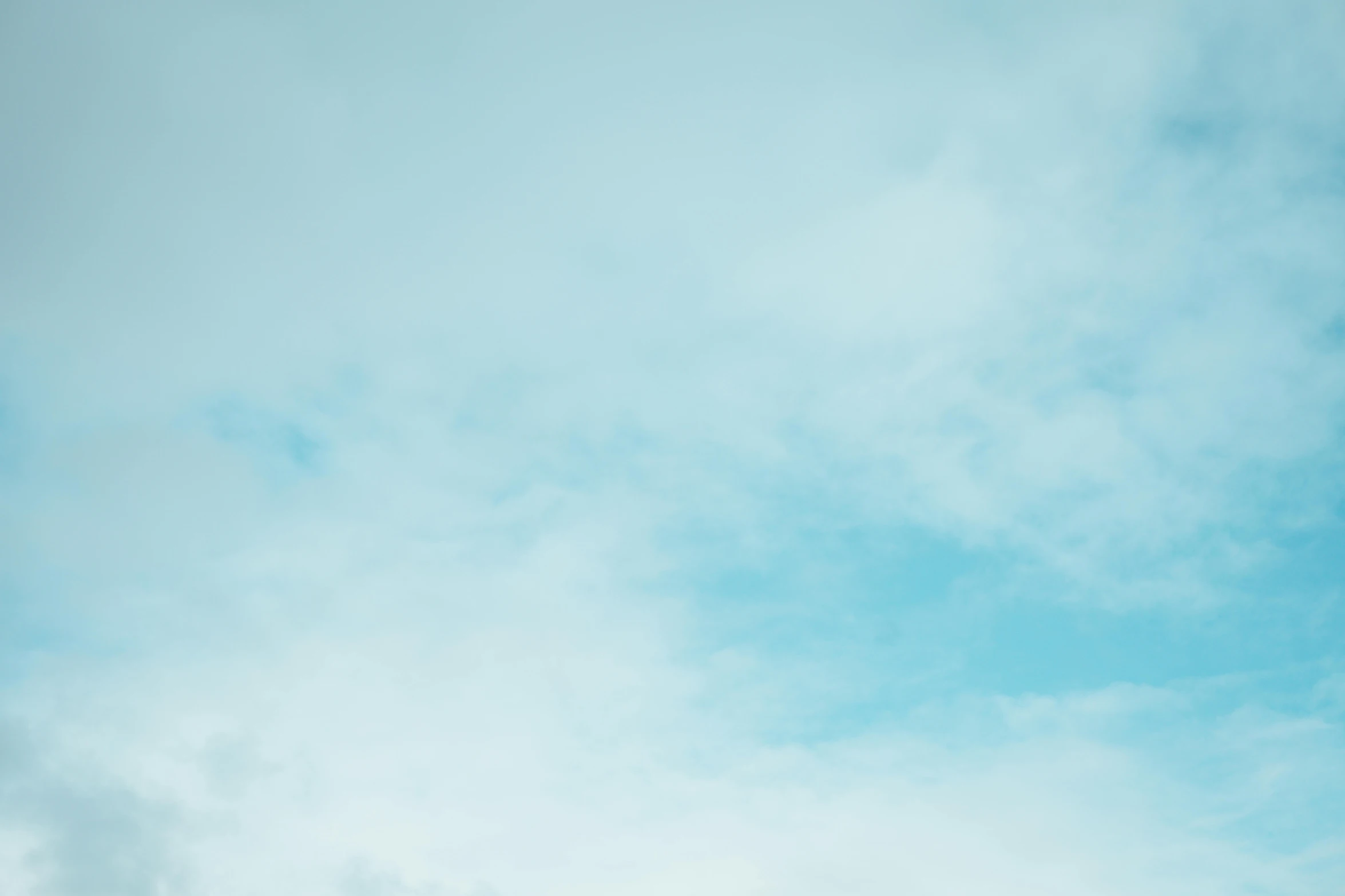 a man riding a snowboard on top of a snow covered slope, inspired by Elsa Bleda, unsplash, minimalism, upon the clouds, pastel blue, minimal canon 5 0 mm, minimalist wallpaper