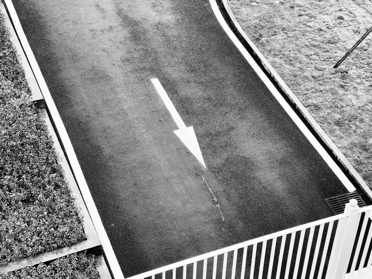 a black and white photo of a street, postminimalism, arrow shaped, oil on canvas high angle view, modern high sharpness photo