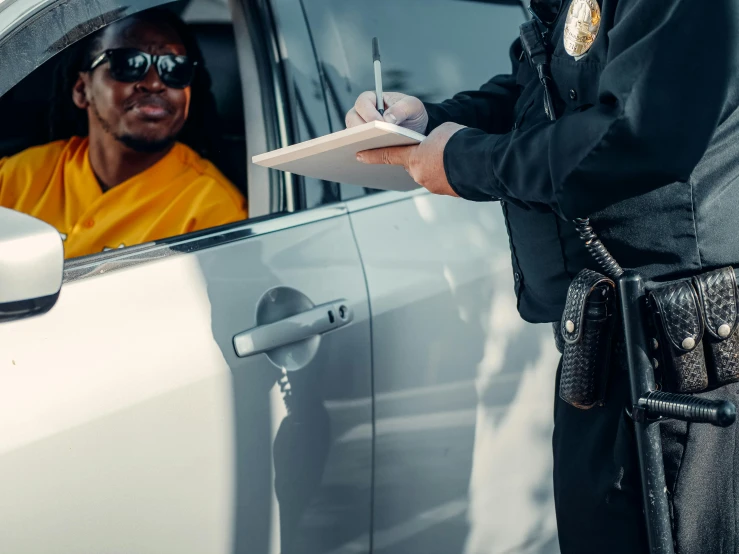 a police officer talking to a man in a car, pexels contest winner, private press, kim kardashian as a cop, 🚿🗝📝, signing a bill, print ready