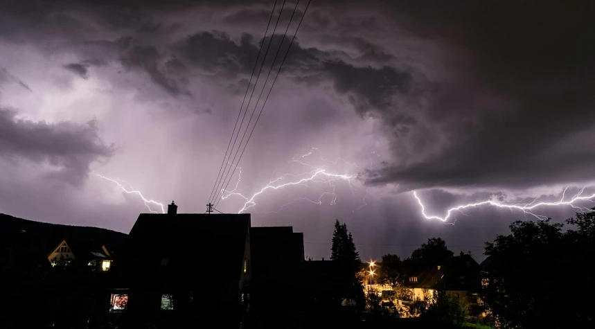 a dark sky filled with lots of lightning, by Jesper Knudsen, pexels contest winner, happening, night time footage, istock, during a hail storm, electricity archs