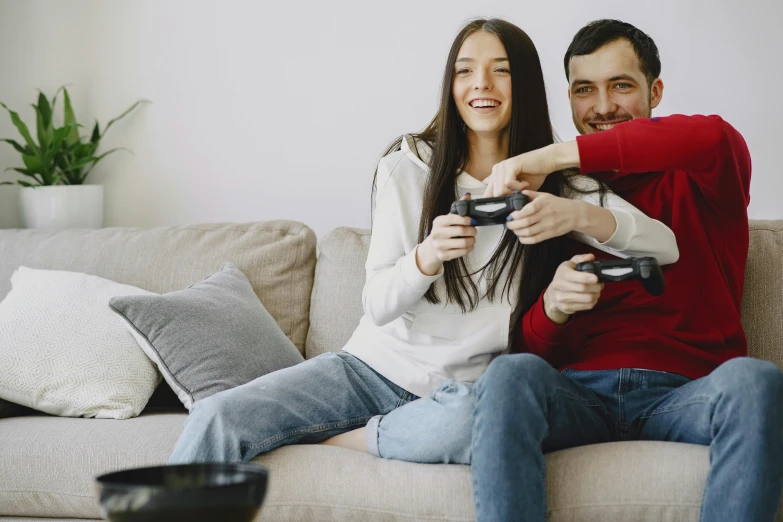 a man and a woman sitting on a couch playing a video game, pexels contest winner, renaissance, maintenance, avatar image, happy family, nvidia promotional image