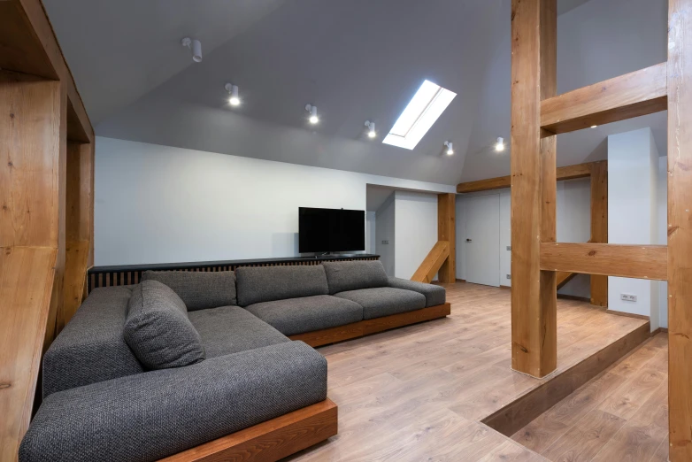 a living room filled with furniture and a flat screen tv, inspired by Otakar Sedloň, light and space, mezzanine, athletic build, studio 4 k quality, gaming room