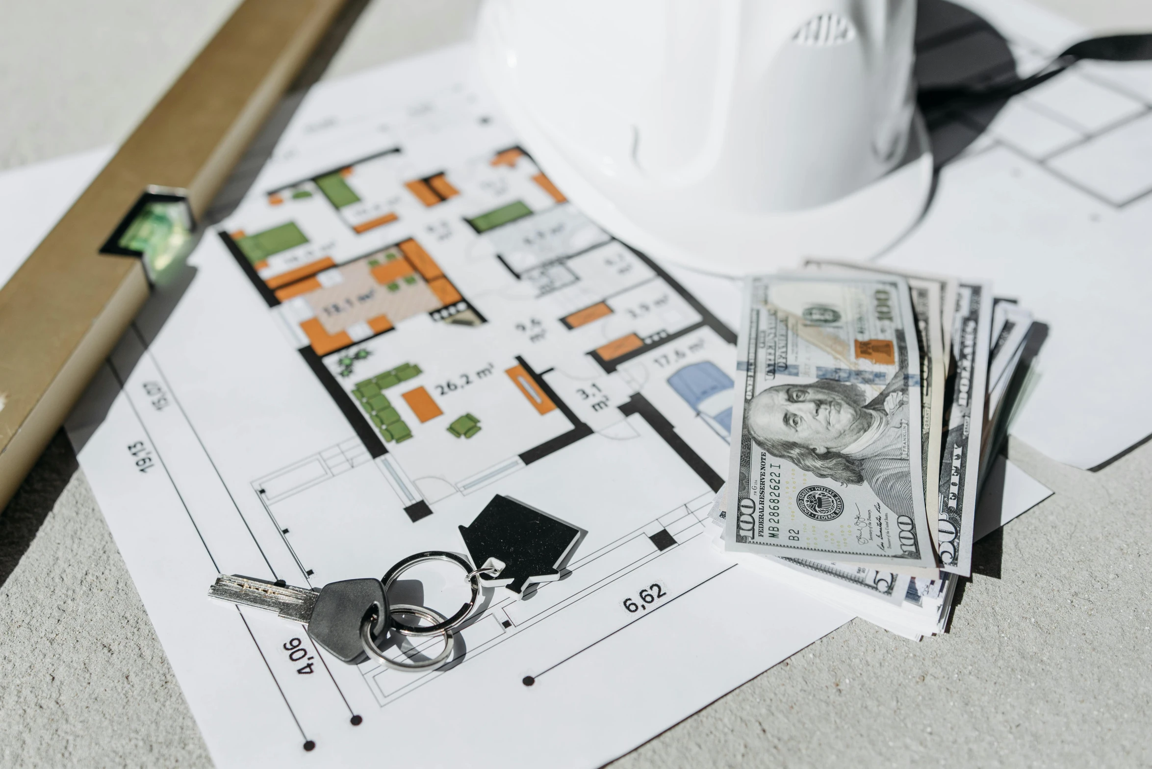 a white hard hat sitting on top of a table, a detailed drawing, pexels contest winner, banknote, apartment design, built on a small, sales