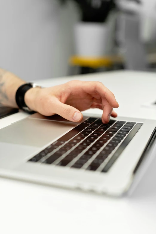 a close up of a person typing on a laptop, by Carey Morris, high-quality photo, kacper niepokolczycki, centered shot, stockphoto