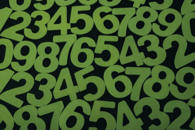 a pile of green numbers sitting on top of a table, 64x64, vinyl material, detail shot, lime green