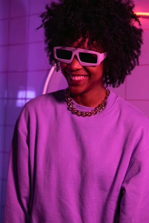 a close up of a person wearing sunglasses, trending on pexels, afrofuturism, brightly lit purple room, streetwear, looking happy, dolman