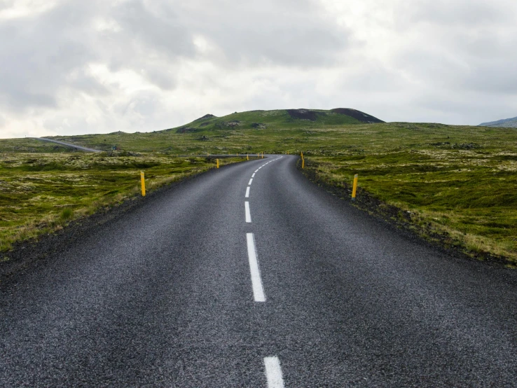 an empty road in the middle of nowhere, an album cover, by Hallsteinn Sigurðsson, pexels contest winner, wide greenways, top of the hill, hammershøi, runway