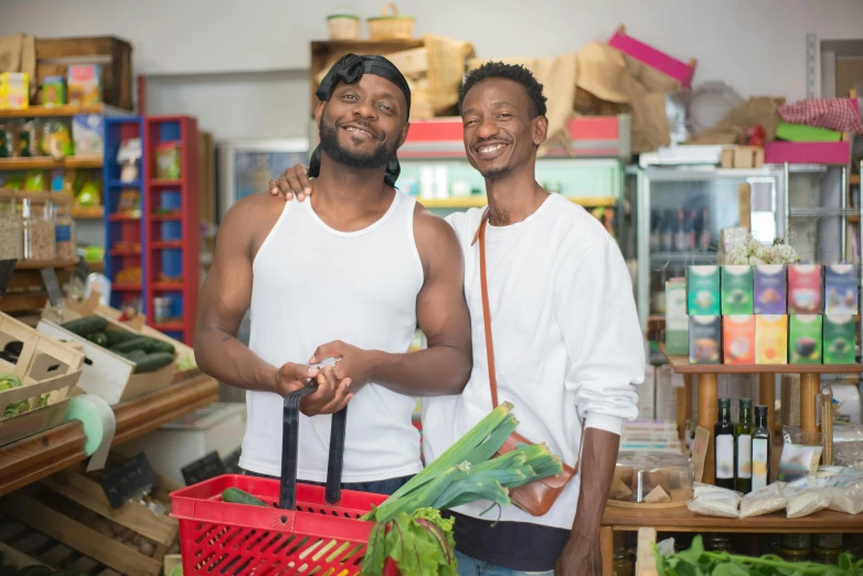 a couple of men standing next to each other in a store, pexels contest winner, renaissance, very kenyan, greens), portrait image, lgbtq