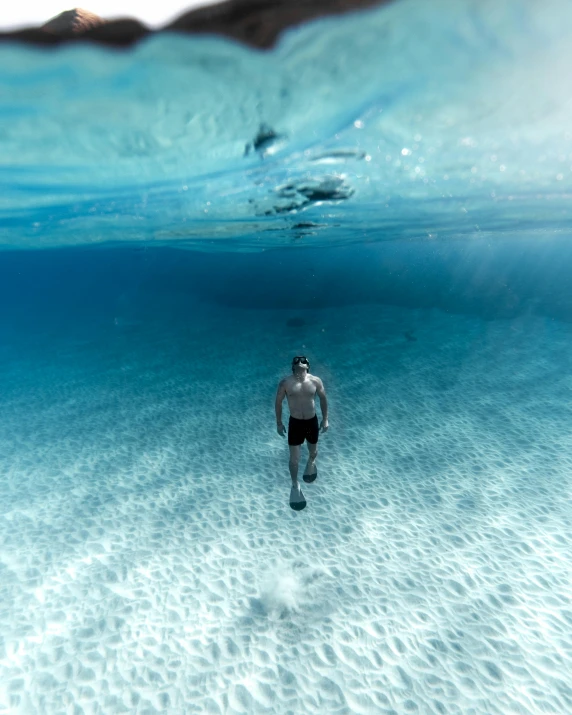 a man that is standing in the water, pexels contest winner, at the bottom of the ocean, walking down, hydration, thumbnail