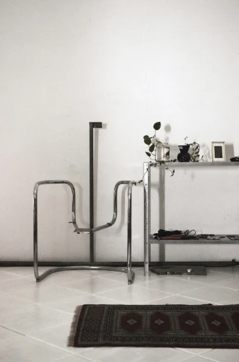 a black and white photo of a living room, inspired by Marcel Duchamp, unsplash, conceptual art, chrome tubes, standing water, colour photograph, bench