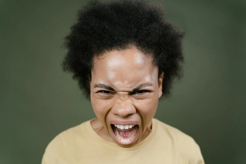 a woman with an angry expression on her face, by Sebastian Spreng, trending on pexels, hurufiyya, childish, screaming, black teenage boy, avatar image