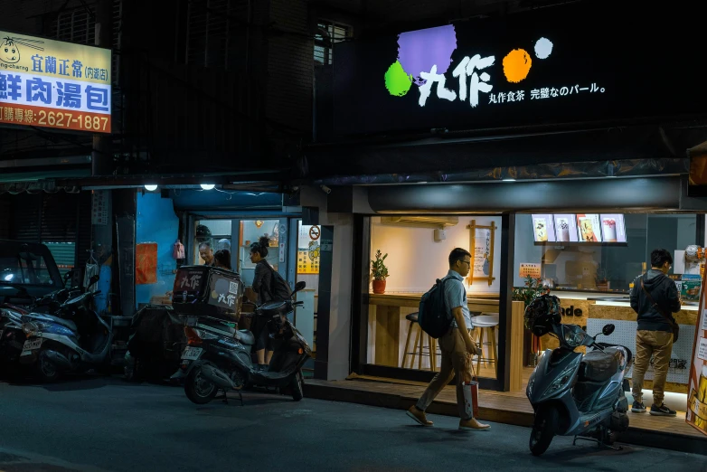 a group of motor scooters parked in front of a restaurant, inspired by Cui Bai, unsplash contest winner, shin hanga, night life buildings, profile image, people walking around, 千 葉 雄 大