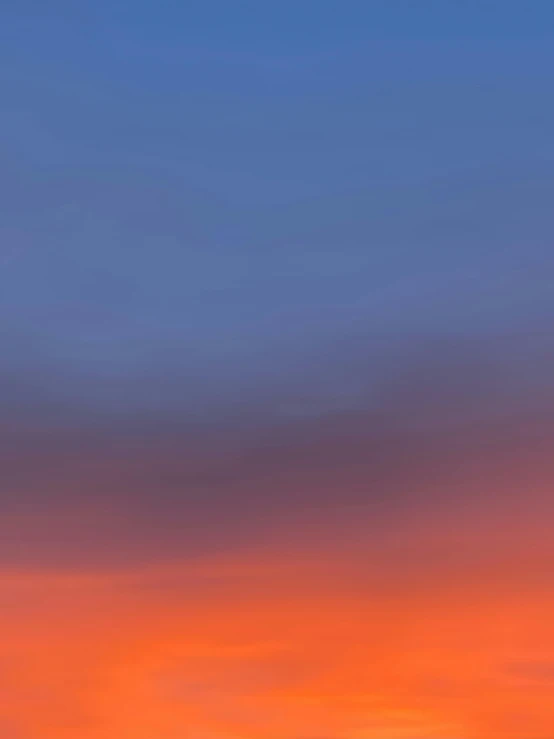 a plane flying in the sky at sunset, by Neil Blevins, minimalism, hd phone wallpaper, orange and blue, sunset panorama, vertical orientation