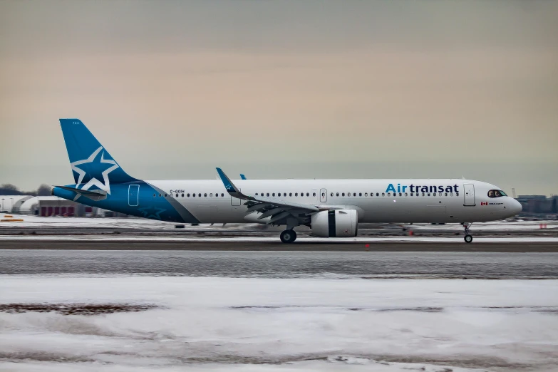 a large jetliner sitting on top of an airport runway, a portrait, pixabay contest winner, arabesque, frosted, avatar image, canada, 3 / 4 wide shot