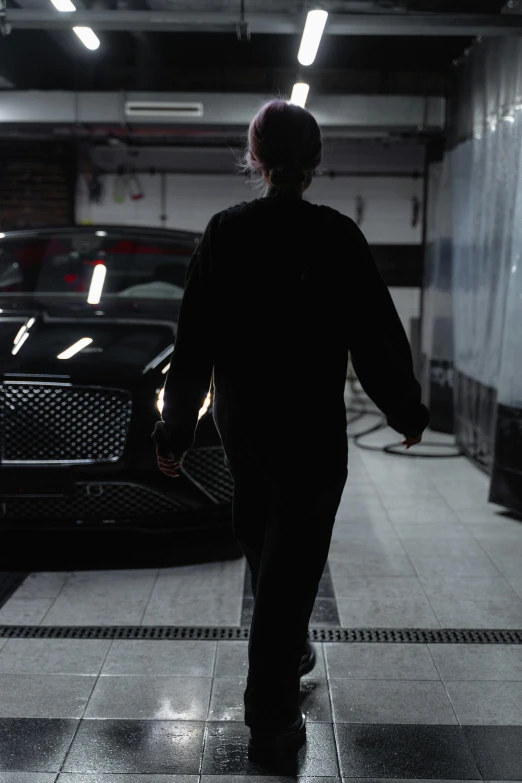 a man walking away from a car in a garage, black clothing, ✨🕌🌙, profile image, ( ( theatrical ) )
