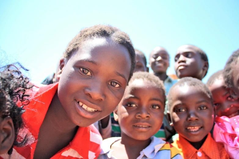 a group of children standing next to each other, up-close, african sybil, gopro photo, illustration »