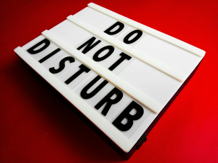 a sign that says don't disturb on it, by Julia Pishtar, light box, pop culture, disturbed, 3 d print