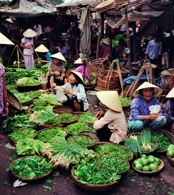 a group of people sitting around baskets of vegetables, flickr, bao phan, 👰 🏇 ❌ 🍃, square, nostalgic 8k