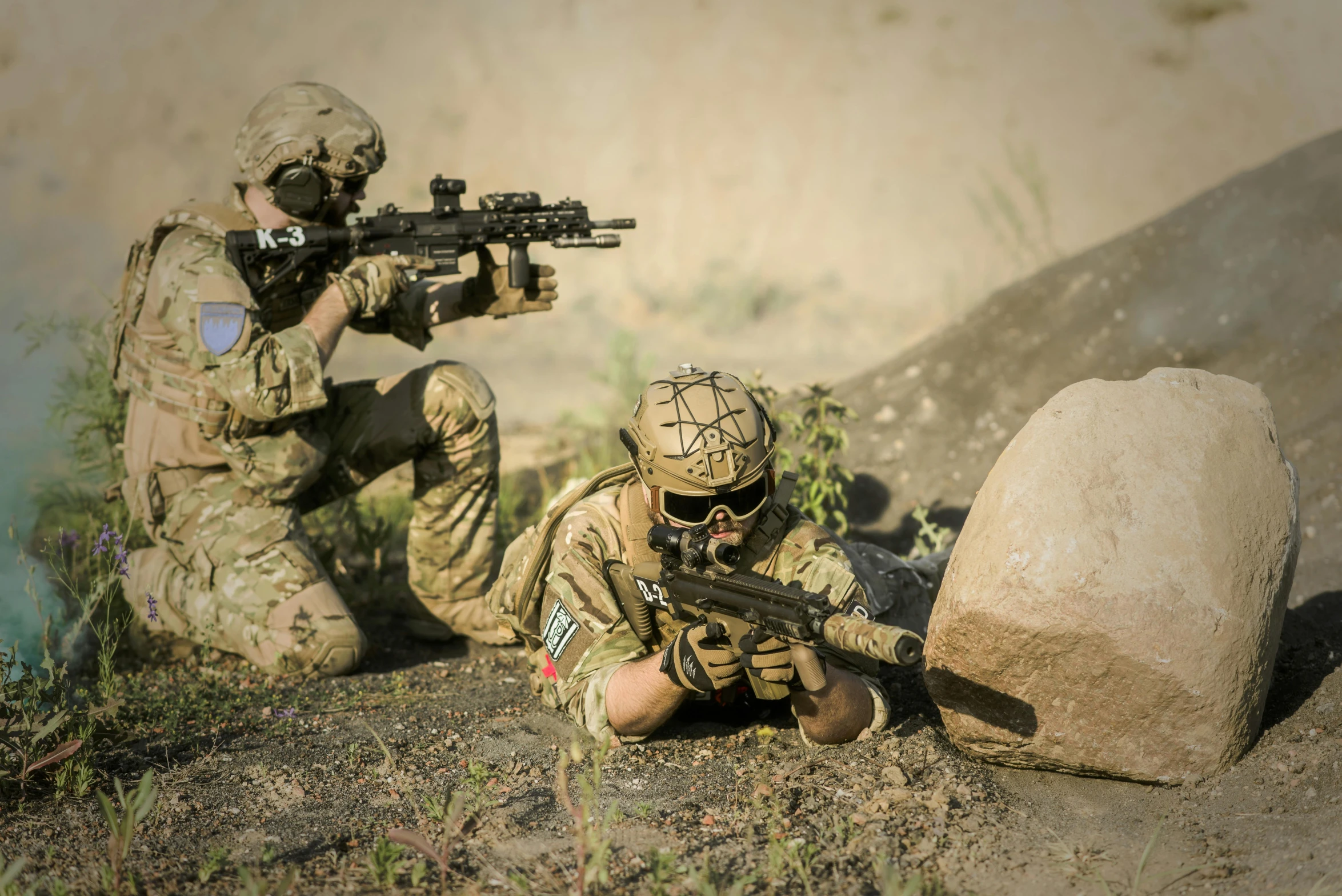 a couple of soldiers sitting next to each other, a picture, by Lee Loughridge, shutterstock, battle action shot, avatar image, on the ground, competition winning
