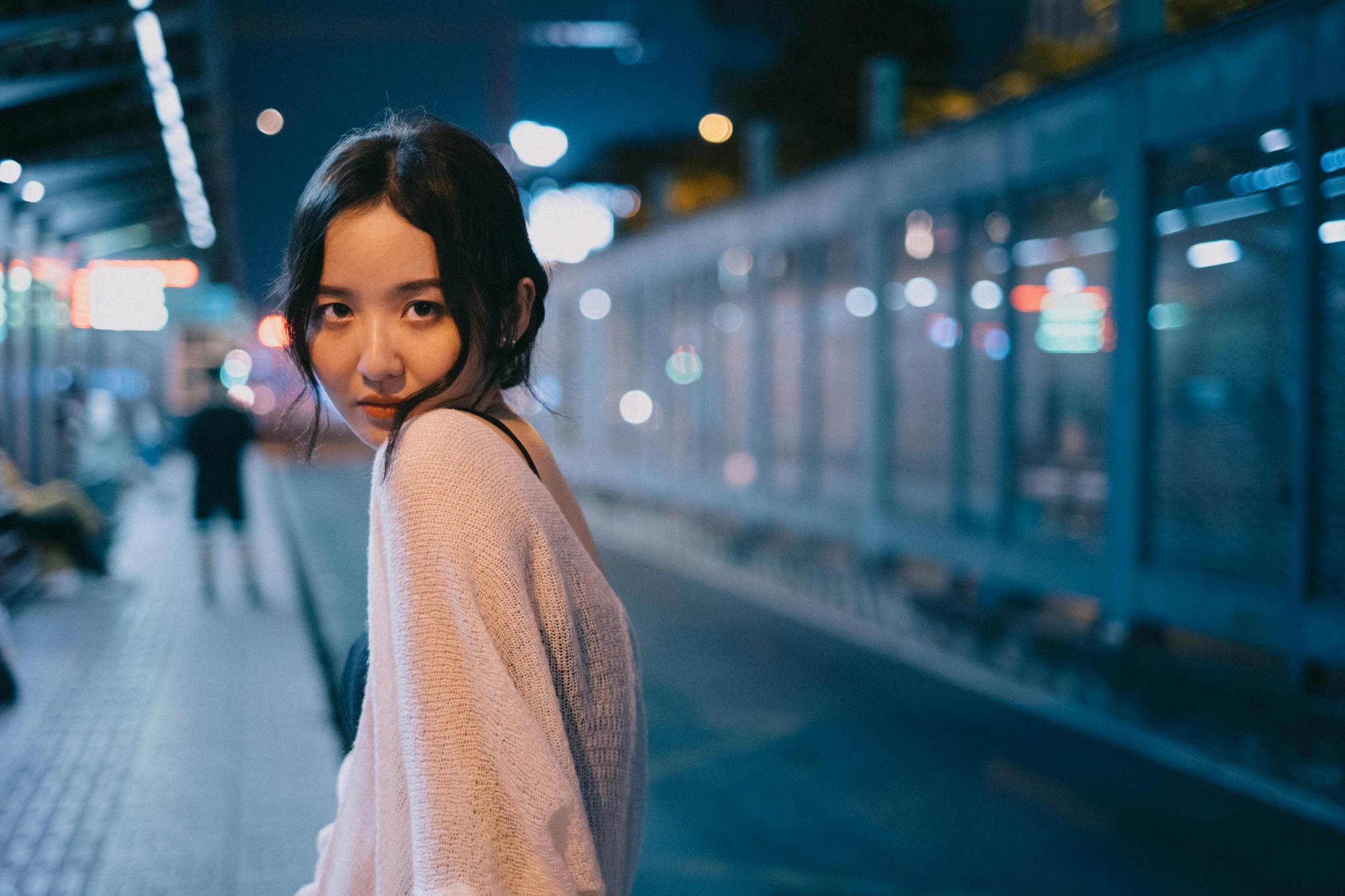 a woman standing on a train platform at night, pexels contest winner, realism, young adorable korean face, in an alley, slight bokeh, standing in a parking lot