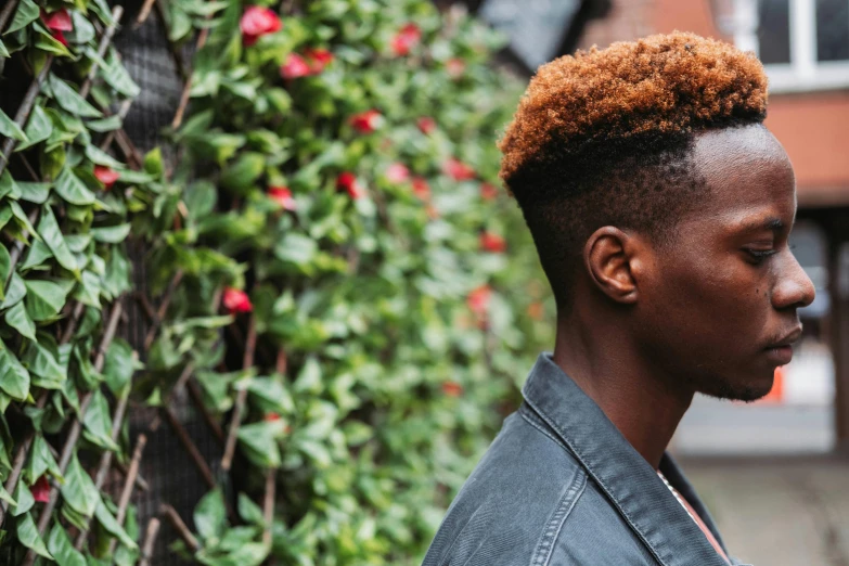 a close up of a person with a hair style, trending on pexels, lush brooklyn urban landscaping, androgyny, copper hair, maria borges