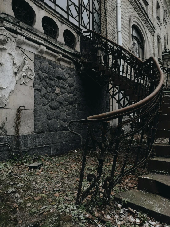 a set of stairs leading up to a building, an album cover, inspired by Elsa Bleda, pexels contest winner, baroque, abandoned graveyard, low quality photo, background image