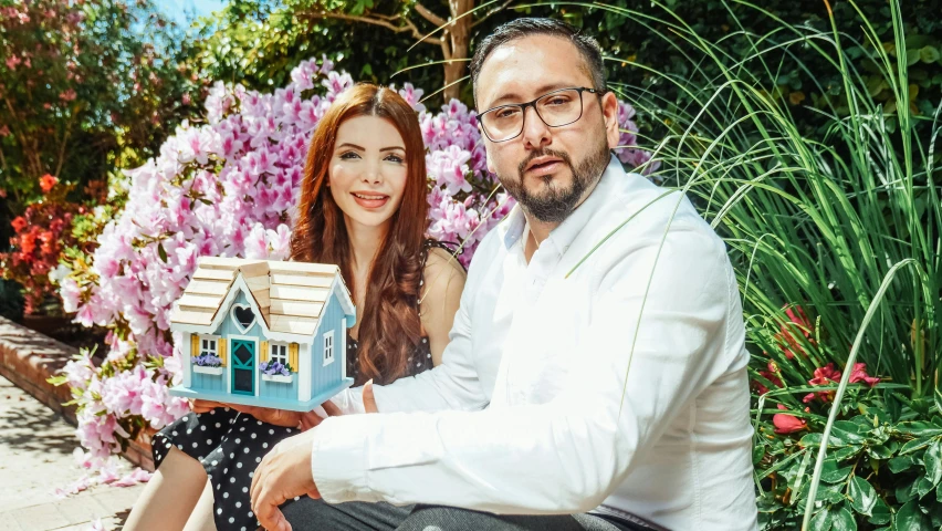 a man and a woman holding a miniature house, a portrait, by Julia Pishtar, avatar image, advertising photo, sam hyde, adar darnov