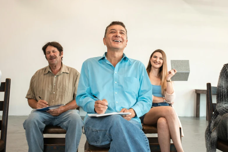 a group of people sitting on top of a wooden bench, a photorealistic painting, by Gavin Hamilton, pexels contest winner, hyperrealism, matthew perry laughing, standing in class, 3 actors on stage, duane hanson