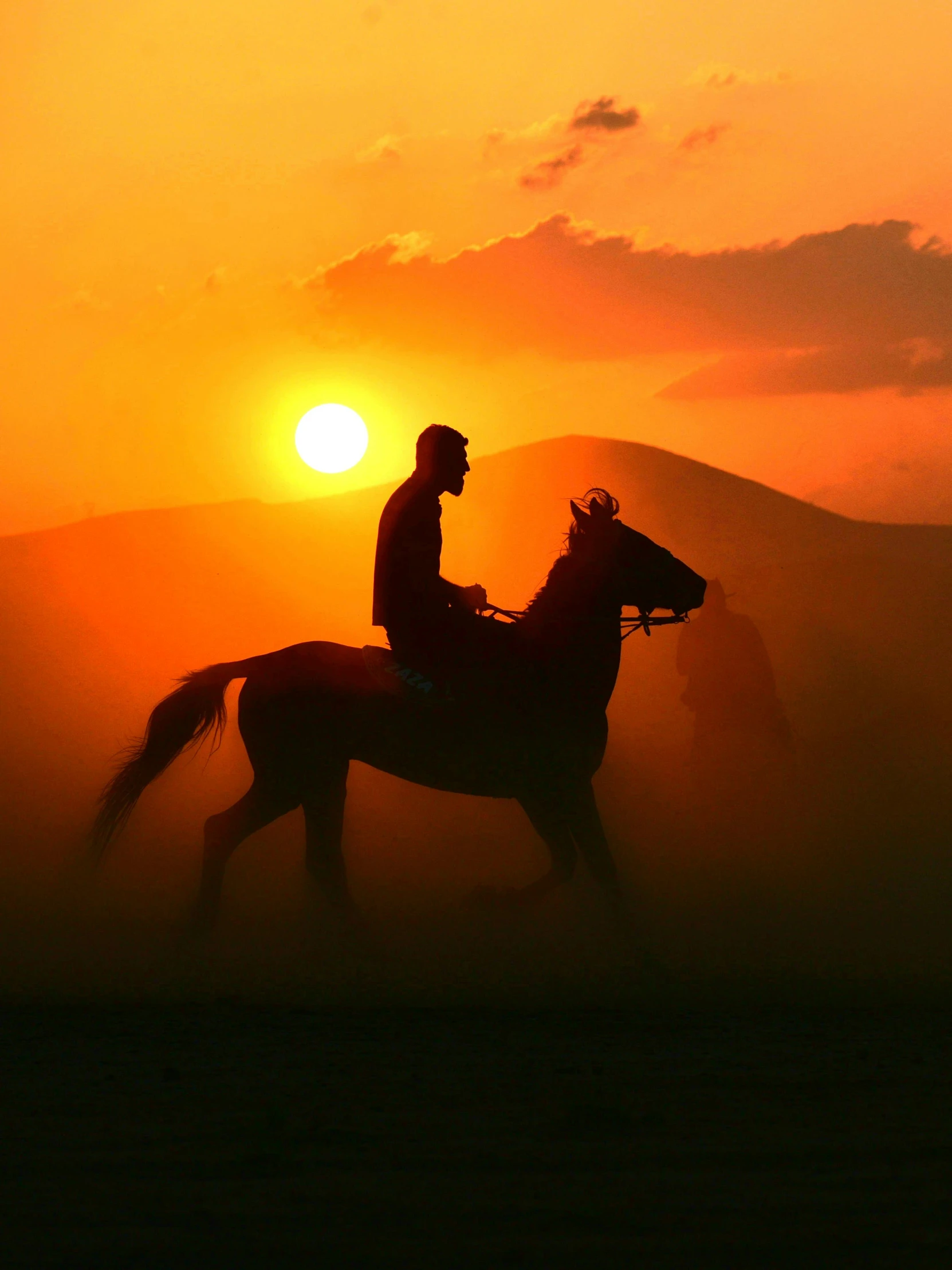 a man riding on the back of a horse at sunset, an album cover, pexels contest winner, romanticism, 👰 🏇 ❌ 🍃, sultan, early morning sunrise, genghis khan