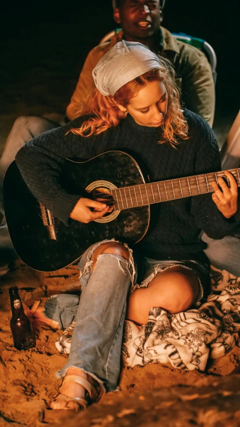 a group of people sitting around a campfire with a guitar, trending on pexels, renaissance, portrait of vanessa morgan, 15081959 21121991 01012000 4k, sydney sweeney, promotional image