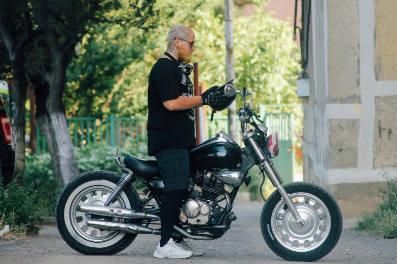 a man that is sitting on a motorcycle, inspired by Hiroshi Honda, unsplash, avatar image, an oldman, 000 — википедия, streetwear