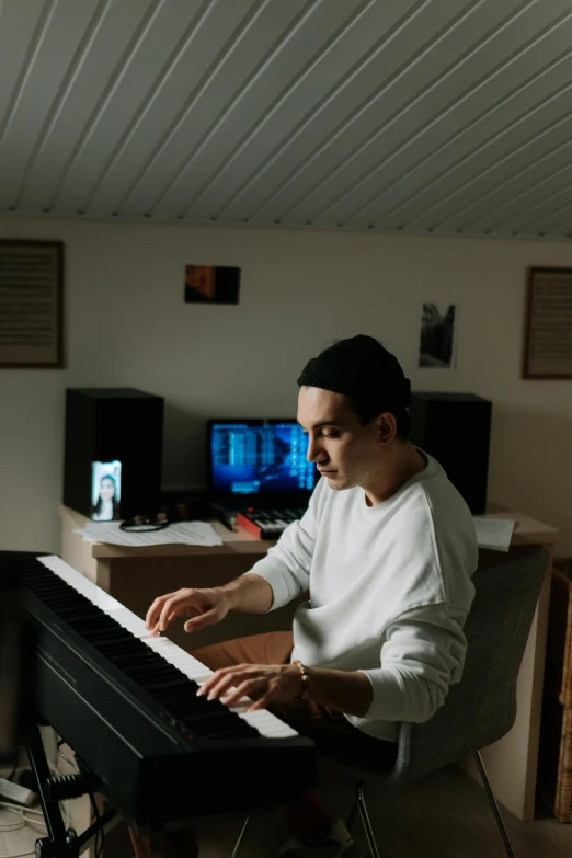 a man sitting in a chair playing a keyboard, pexels contest winner, hyperrealism, in a living room, avatar image, soft vinyl, distant photo