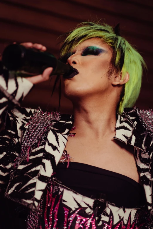 a woman with green hair drinking from a bottle, an album cover, inspired by Aya Goda, pexels, punk concert, lesbians, kazuki tanahashi, profile image