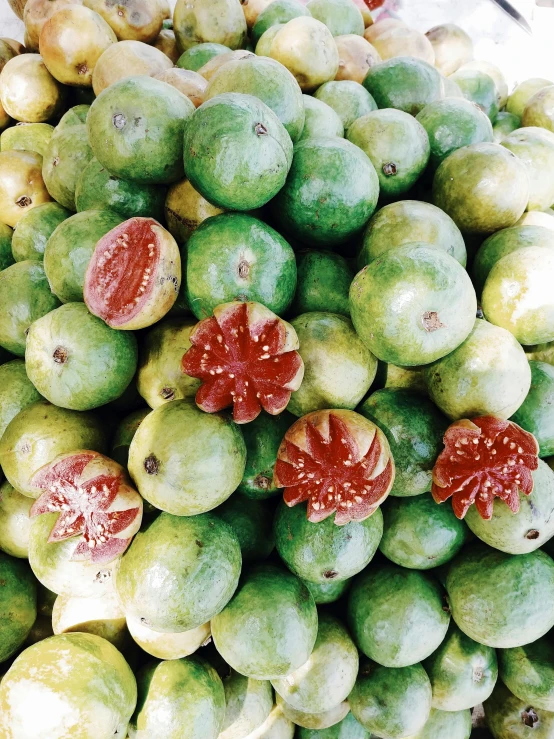 a bunch of fruit sitting on top of a table, lime green, nuttavut baiphowongse, organic and intricate, app